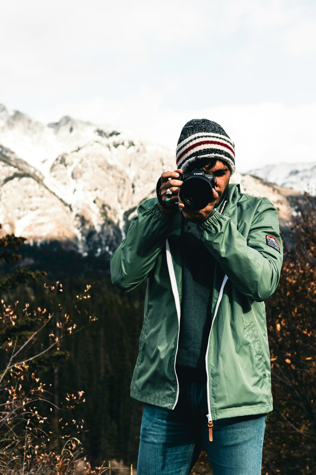 Male documentary photographer smiling outdoors