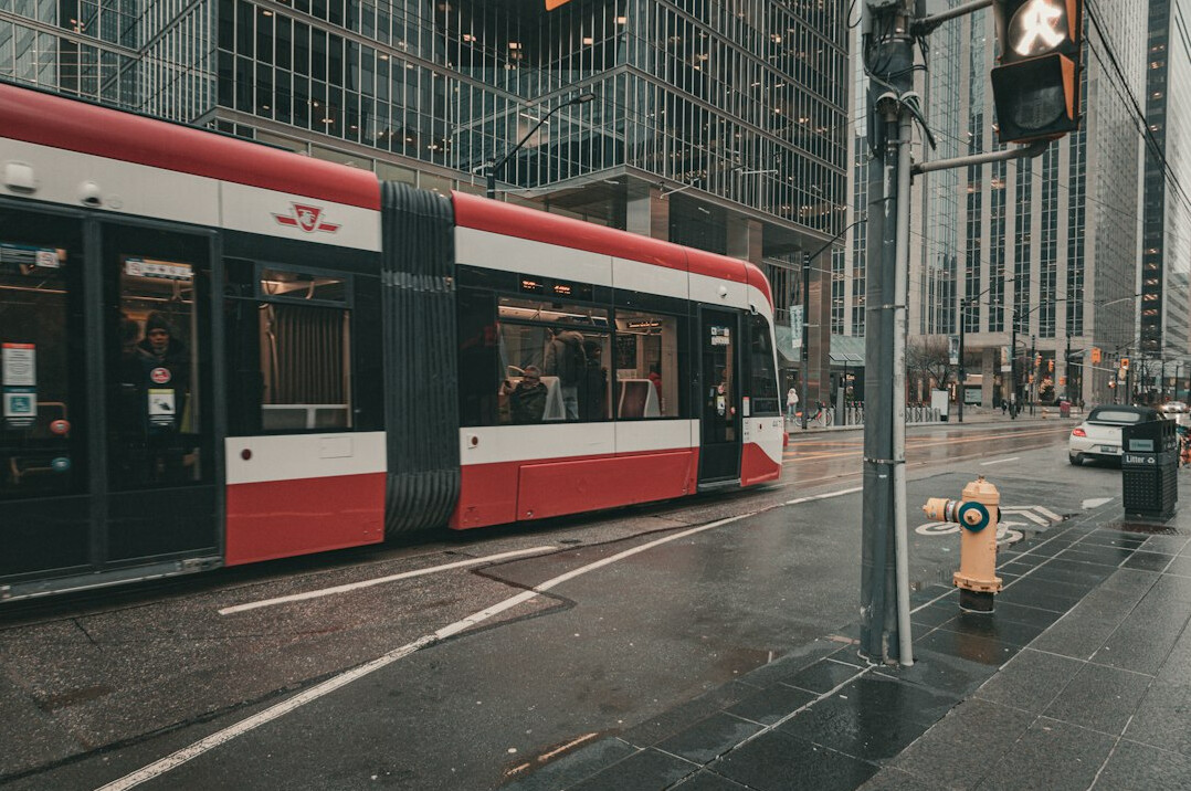 Downtown Toronto street with a streetcar and pedestrians