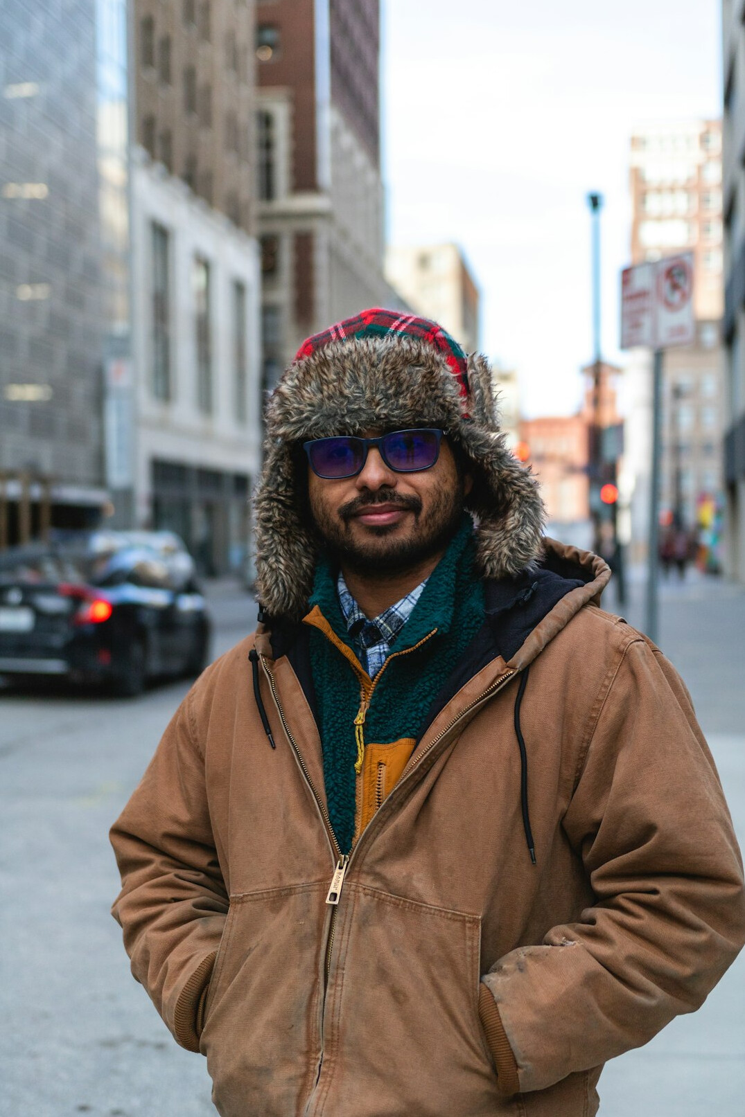 Smiling Canadian man portrait wearing glasses